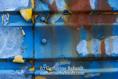 Paint chips on an old school bus